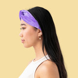 Side profile girl wearing skincare headband long black hair
